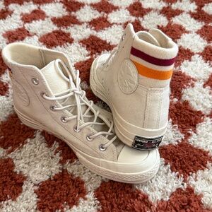 Converse High Top Sneakers in Cream with Red and Yellow Stripe